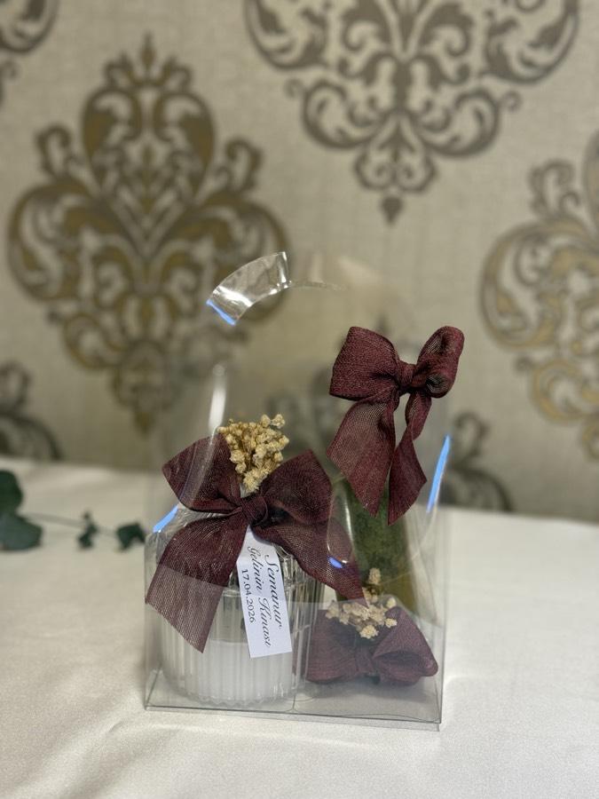 Çantada Mum ve Kına Şişesi